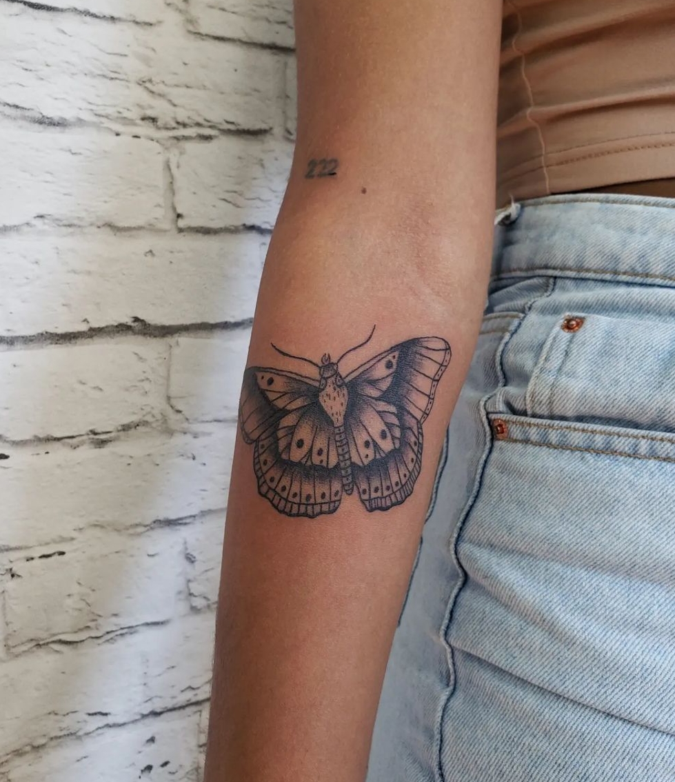 Harry Style Butterfly Tattoo on Arm