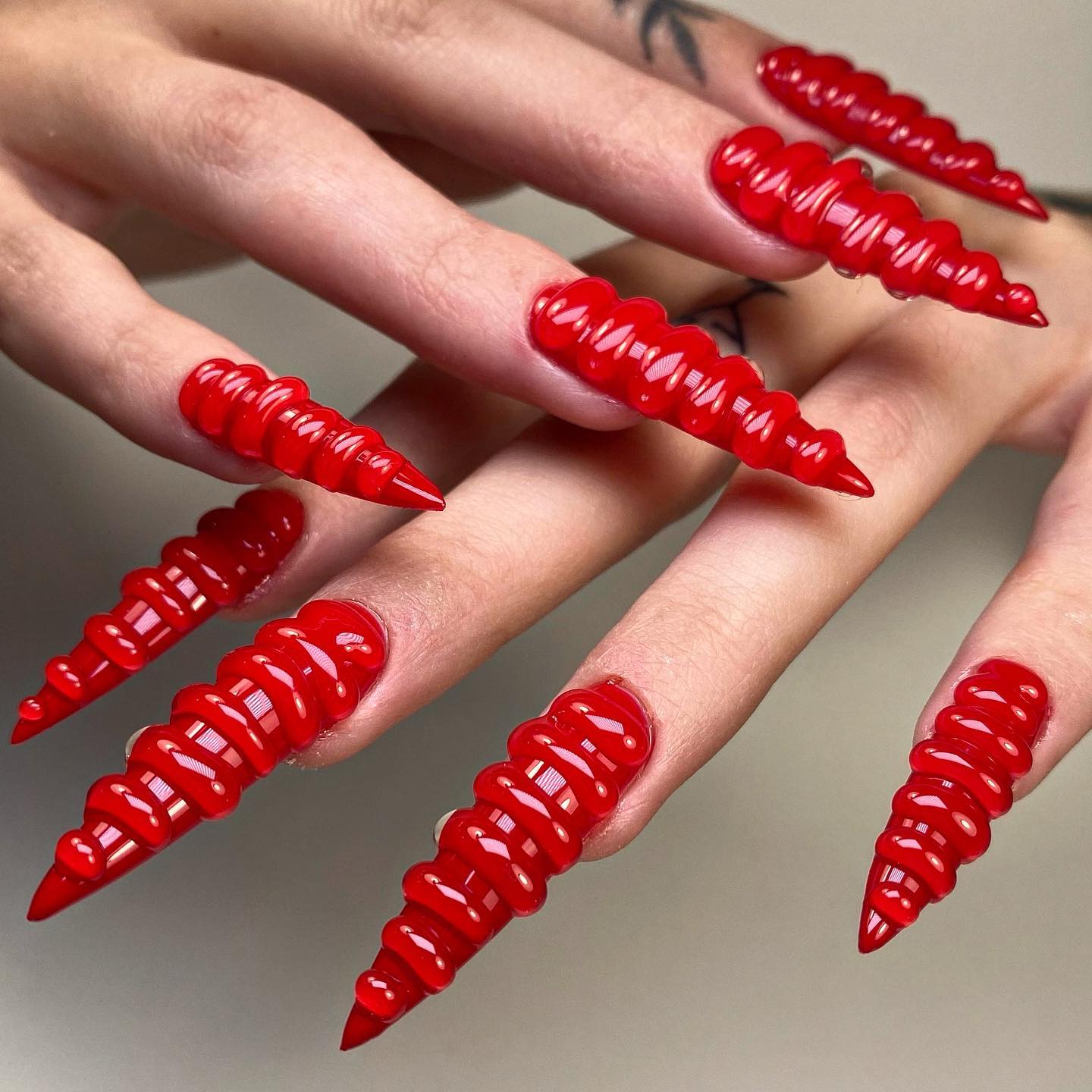Long Red Stiletto Nails with 3D Design