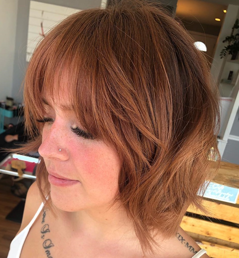 Reddish Layered Bob With Sexy Bangs