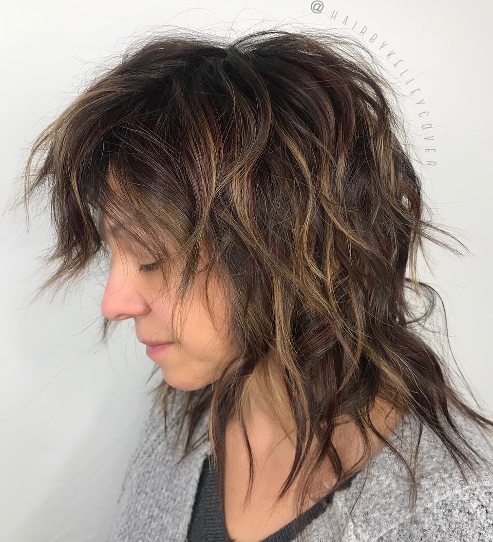 Medium Shaggy Cut With Long Layers On Top