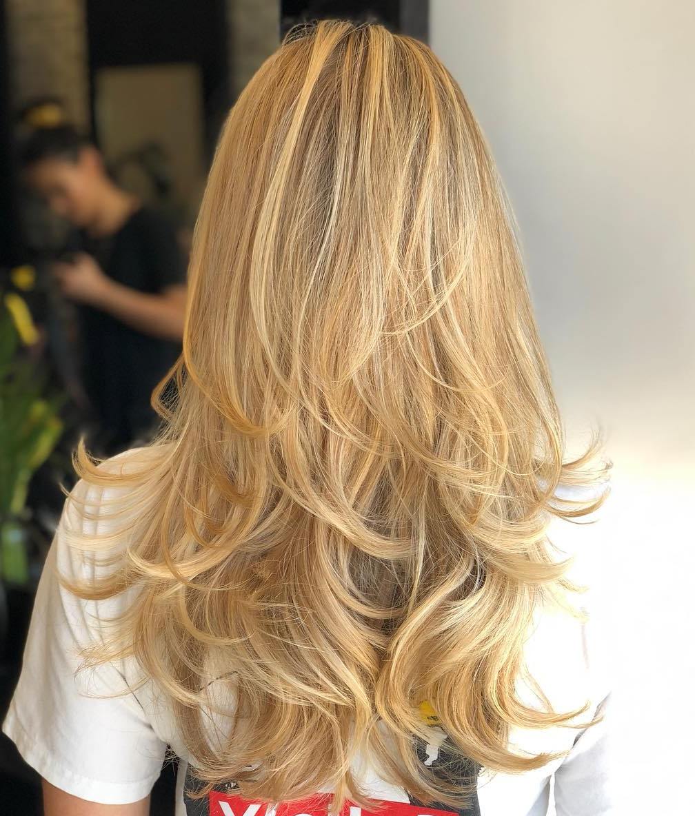 Golden Blonde Layered Hairstyle For Long Hair
