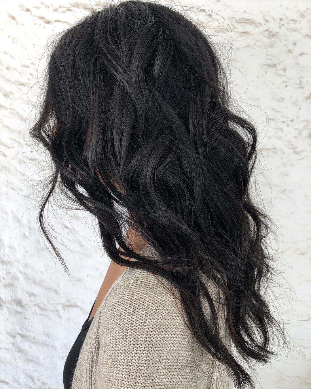 Medium-To-Long Wavy Black Hairstyle