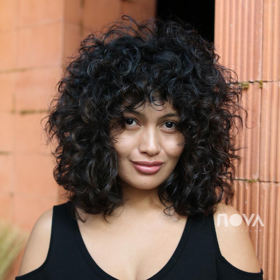 Mid-Length Curly Shag With Bangs