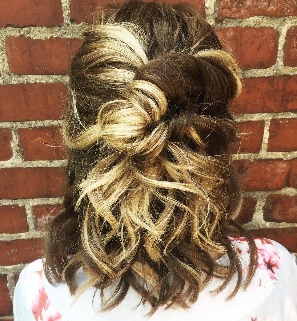 Messy Twisted Half Updo For Thick Hair