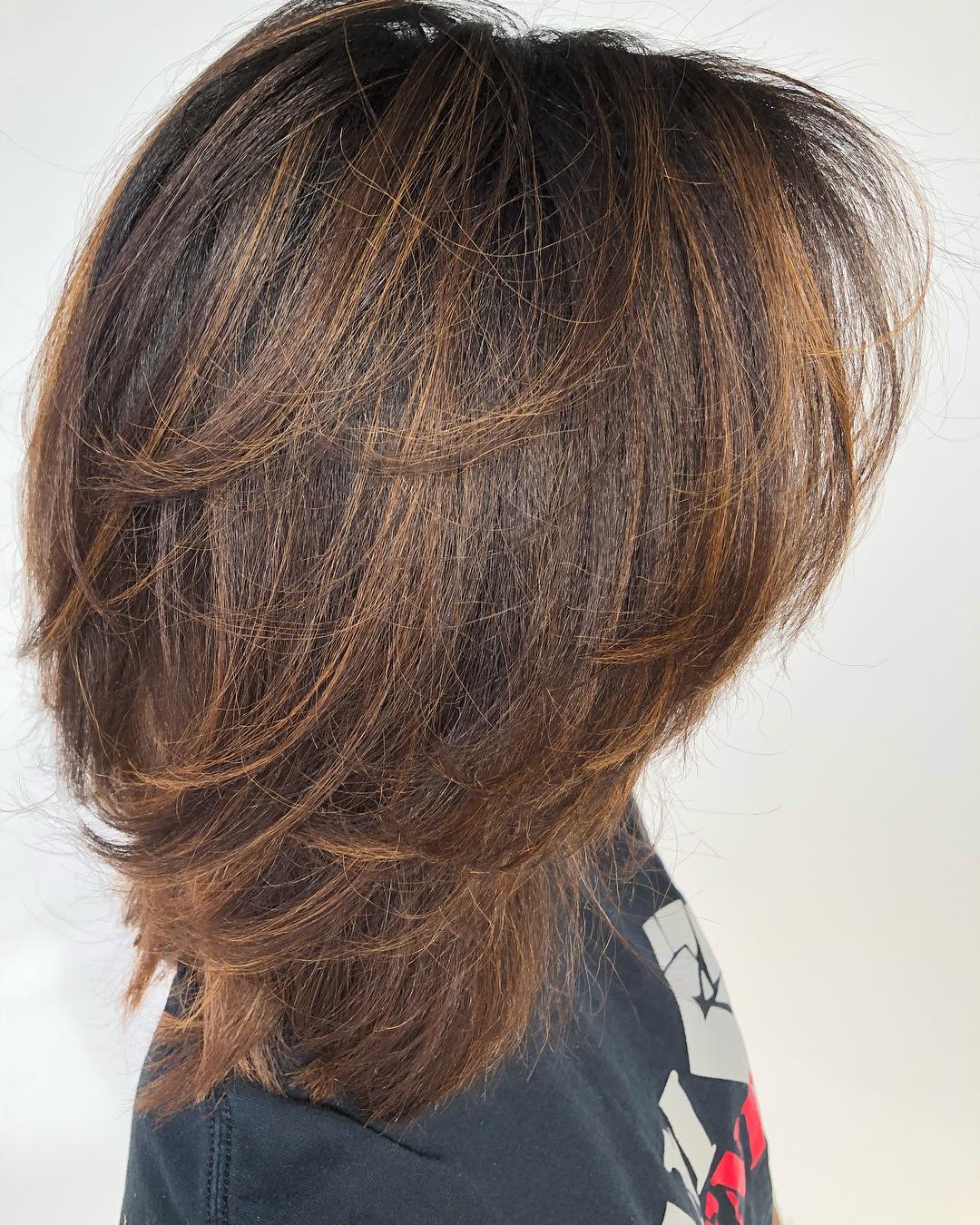 Layered Brunette Hair With Bronze Babylights
