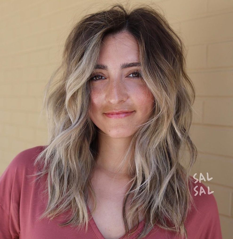 Medium-To-Long Wavy Layered Bronde Hairstyle