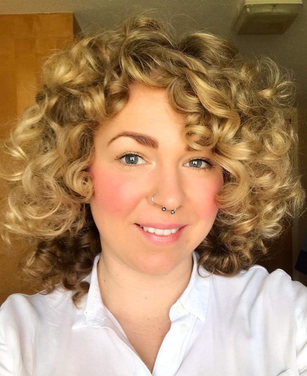 Mid Length Hairstyle With Tight Large Curls
