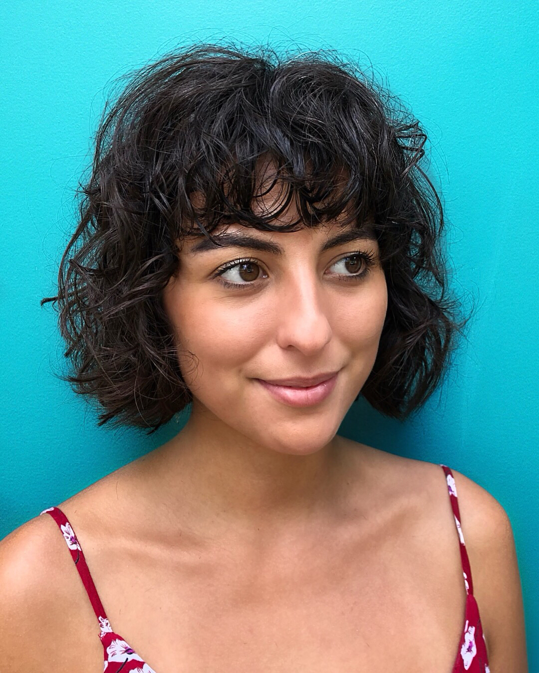 Curly Brunette Bob With Bangs