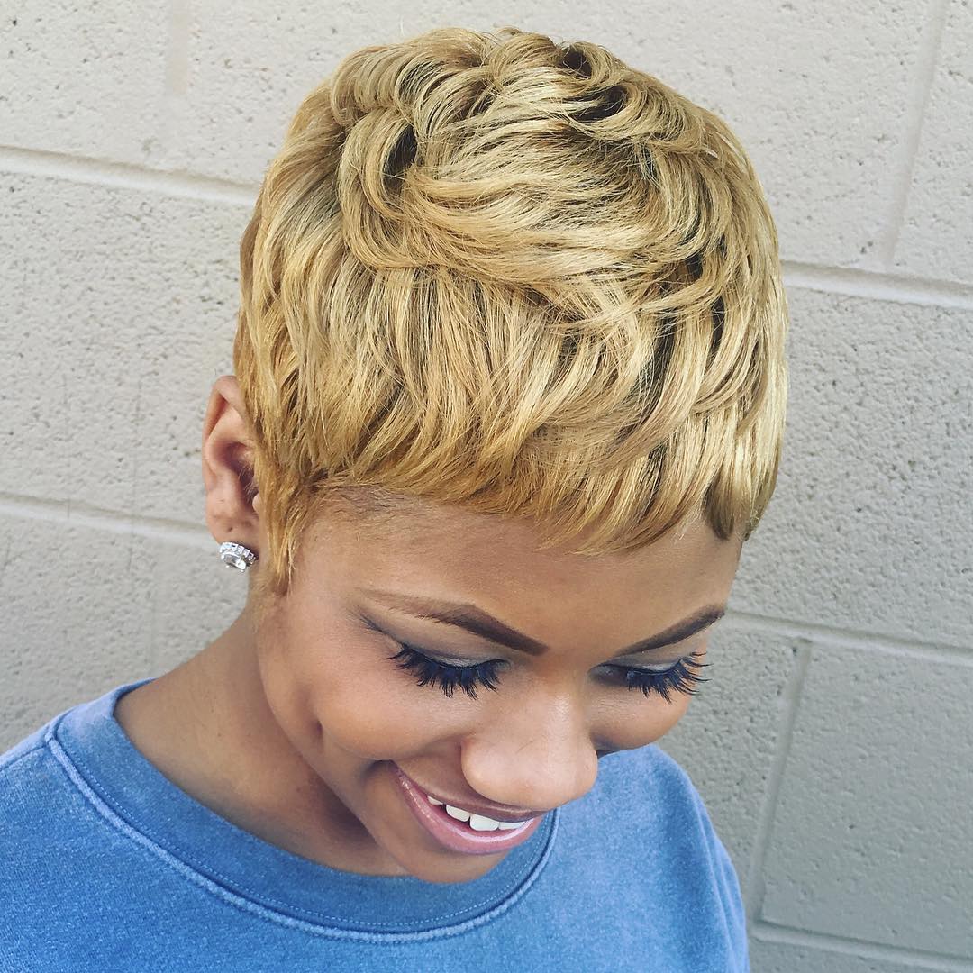 Golden Blonde Cropped Hairstyle With Baby Bangs