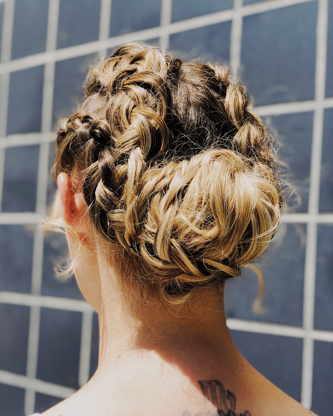 Messy Updo With Braids And Bun