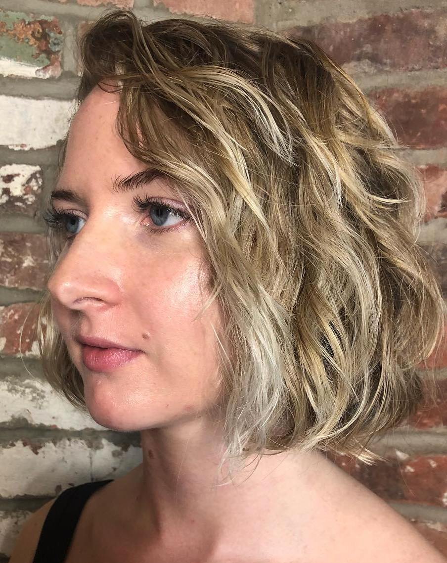 Blonde Curly Bob With Layers And Highlights
