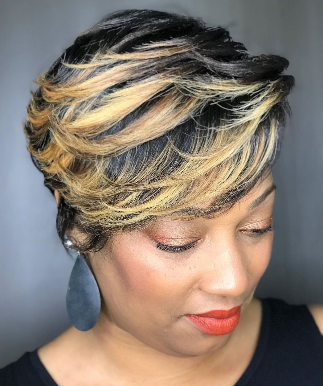 Feathered Short Haircut With Highlights