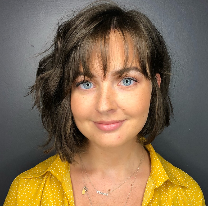 Asymmetrical Wavy Bob With Wispy Bangs