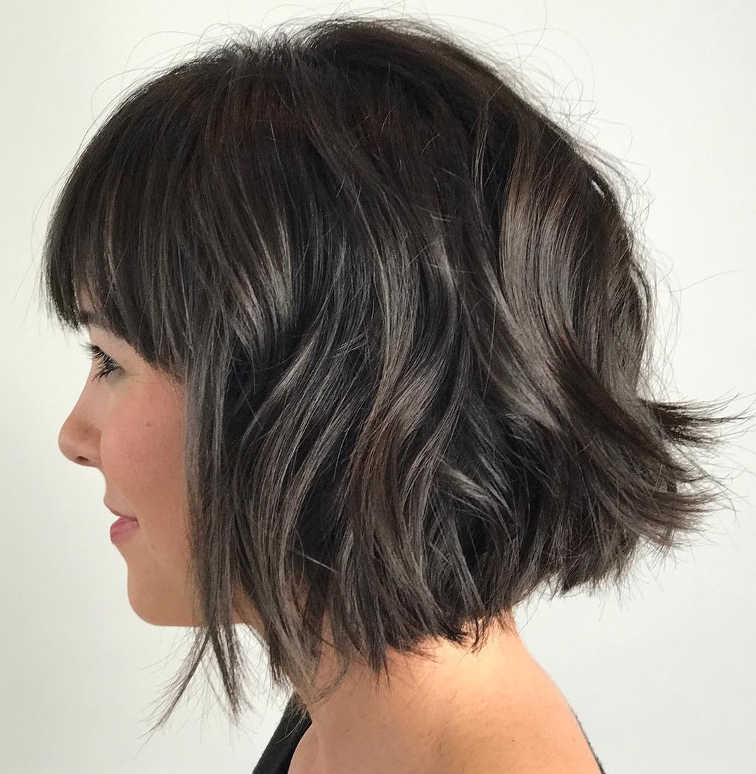 Brown Razored Bob With Subtle Gray Highlights