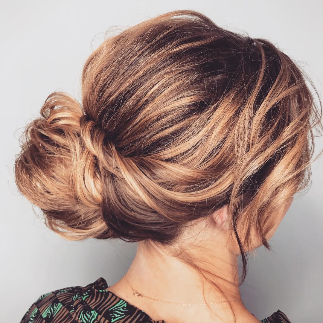 Messy Up-Swept Bun For Layered Hair
