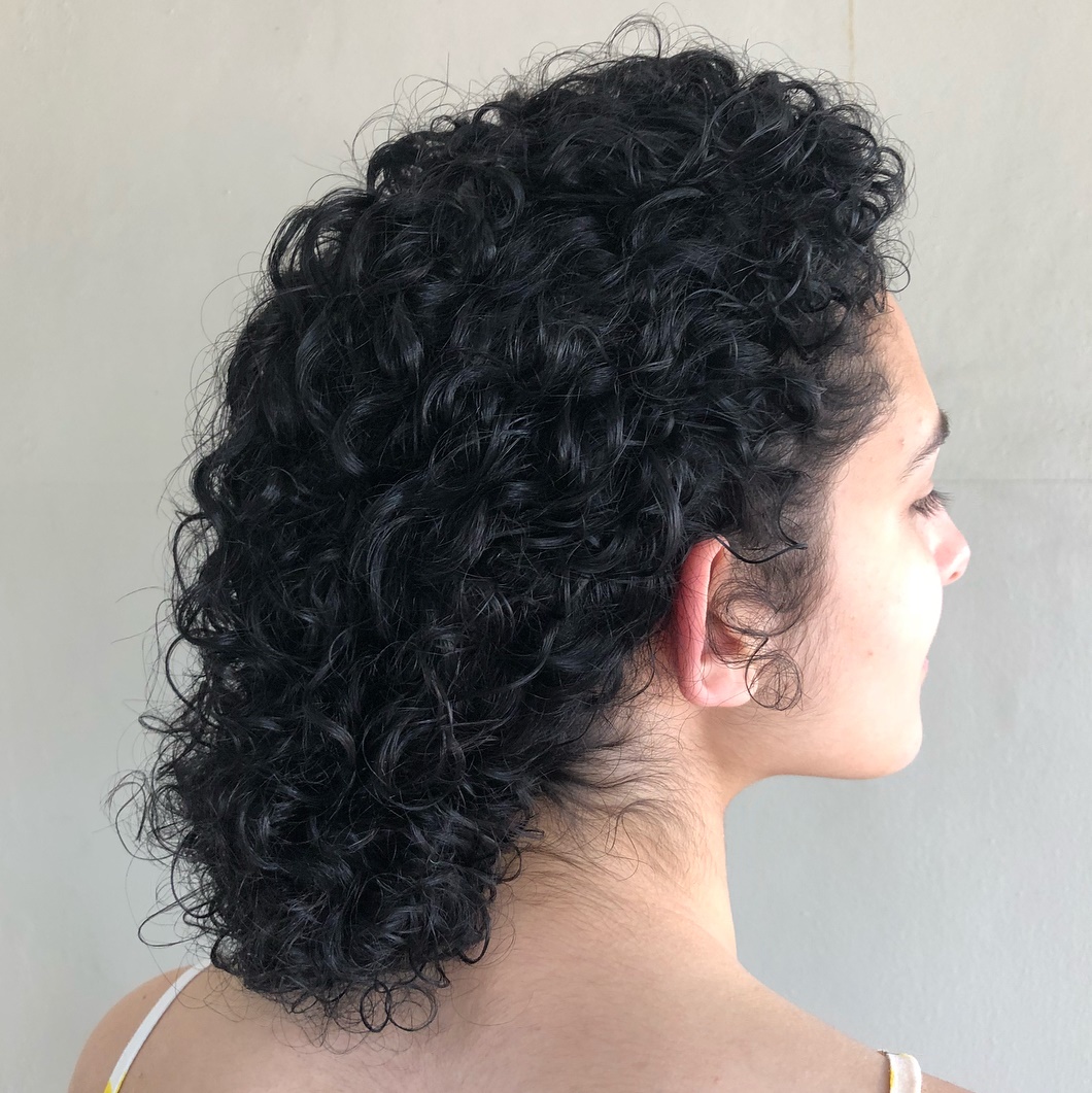 Low Bun Updo For Curly Hair