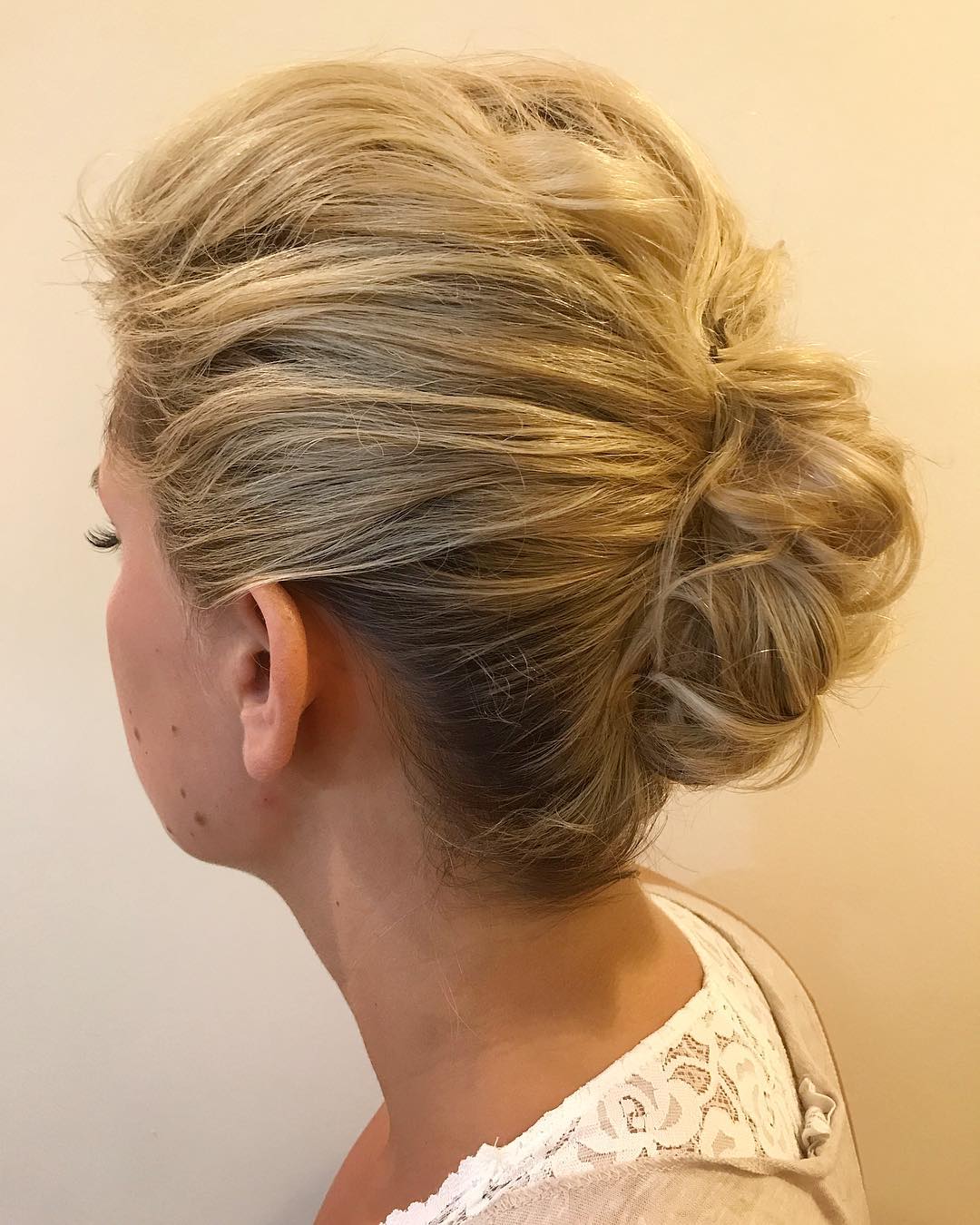 Professional Updo With Teased Roots