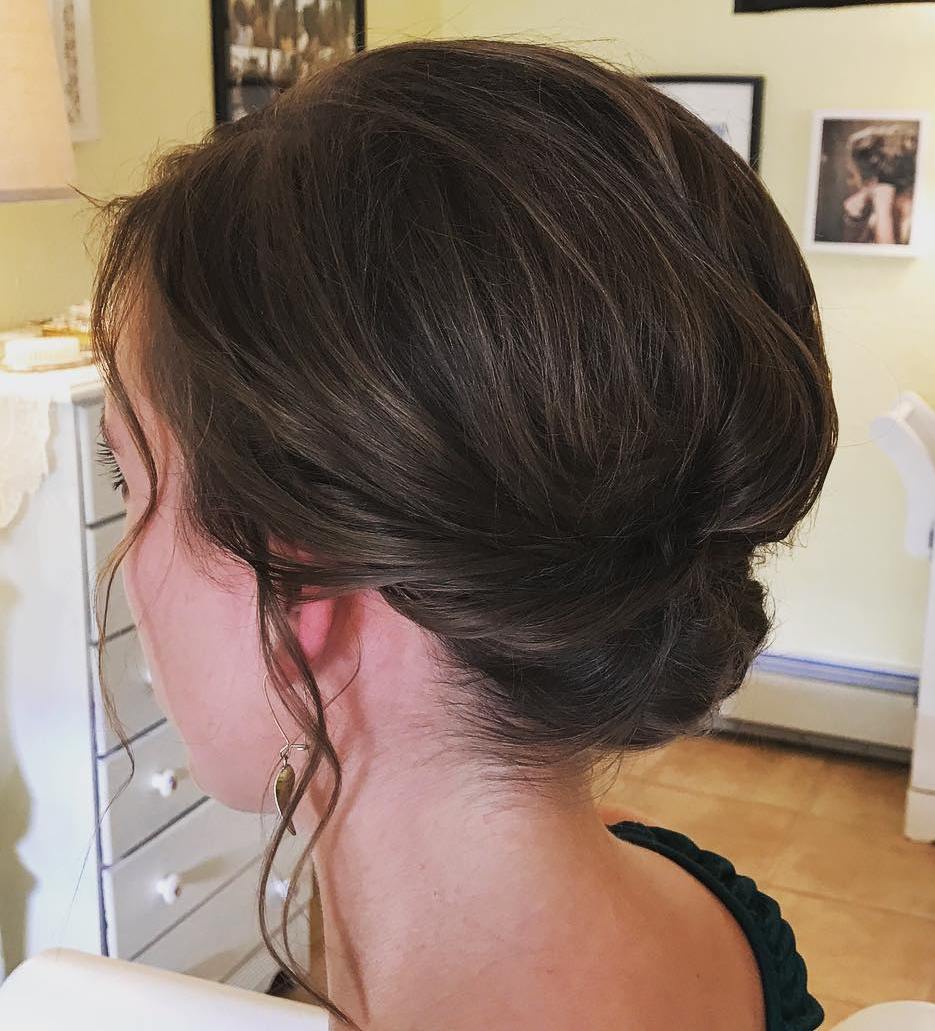 Bohemian Rolled Updo With A Bouffant