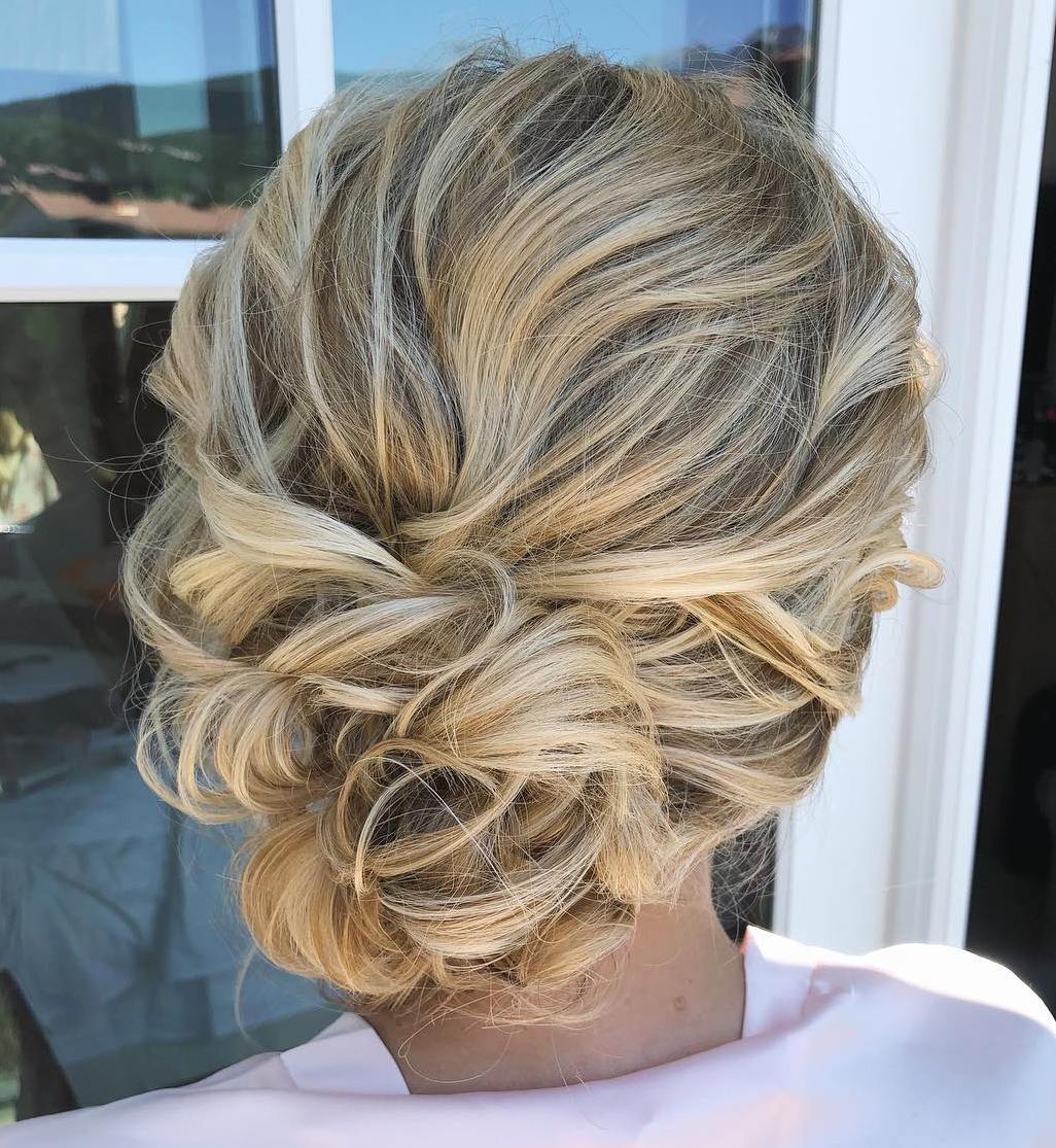 Low Tousled Wavy Updo For Mid Length